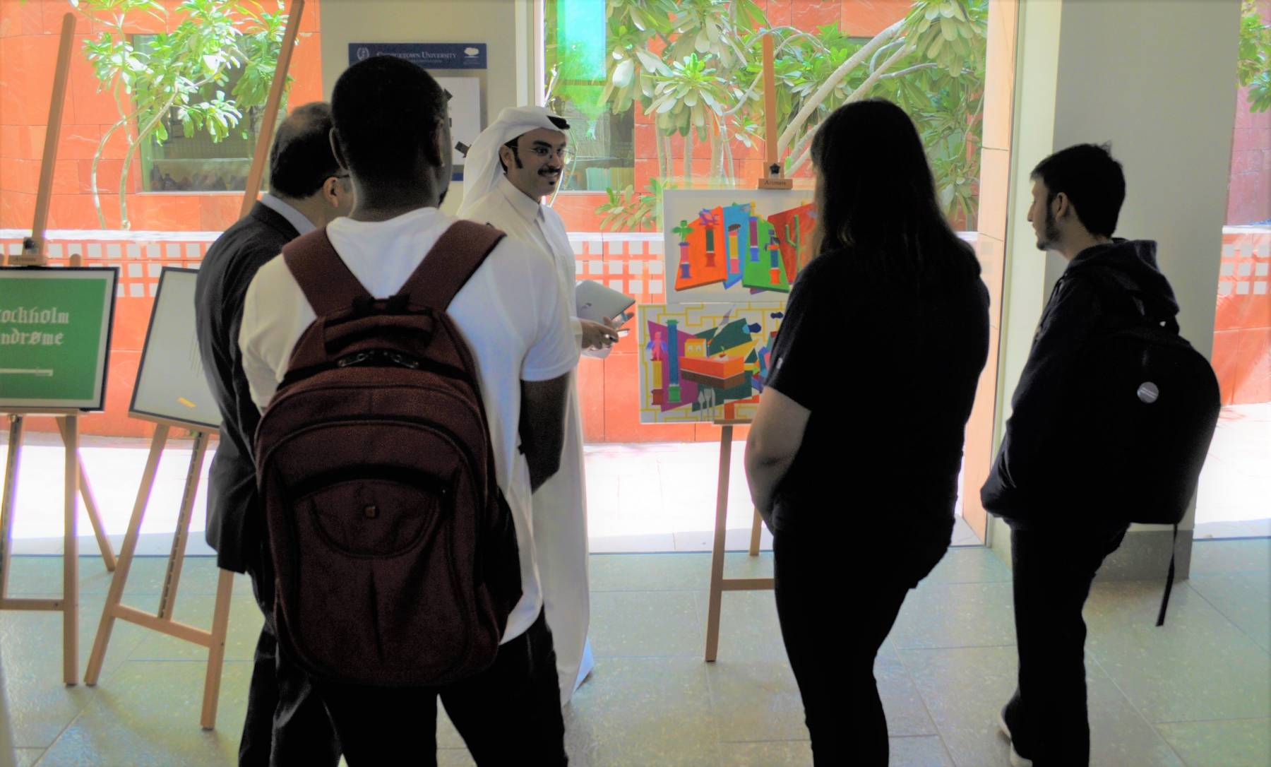 Alumni Mubarak Al Thani during the Art Exhibition and Public Lecture