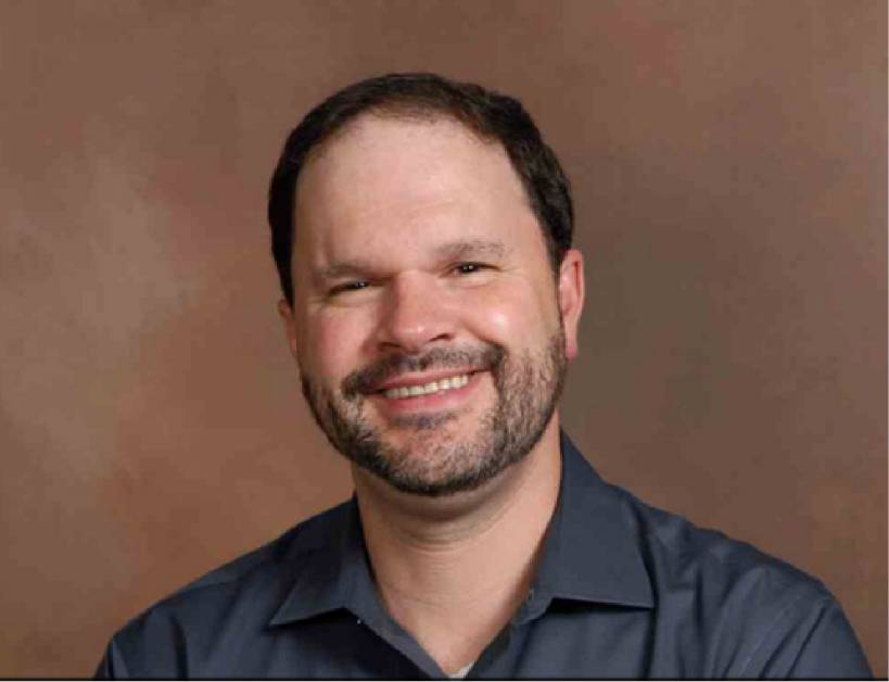 Dr. Adam Thomas