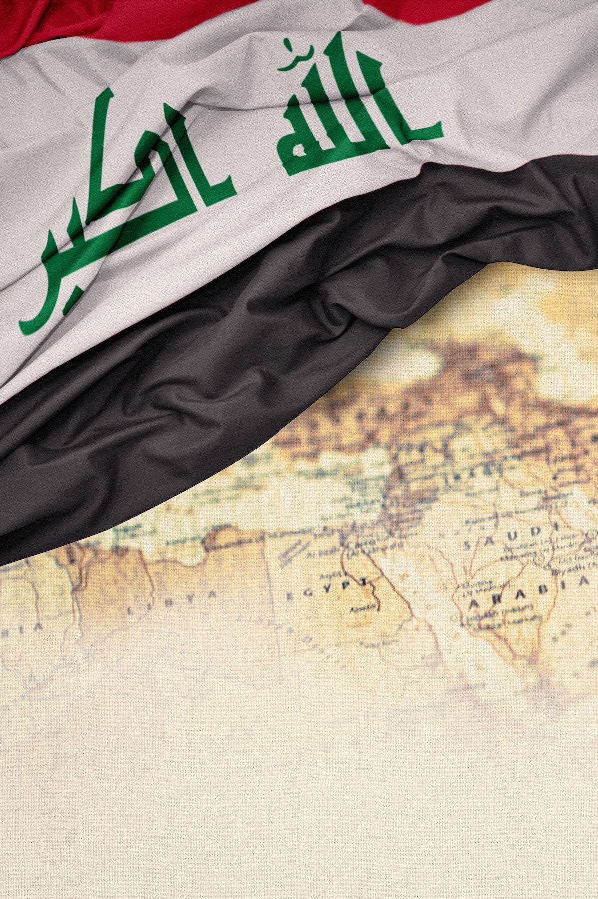 The Iraqi flag draped over a partially visible vintage map, with the flags red, white, black, and green Arabic script clearly shown at the top of the image.